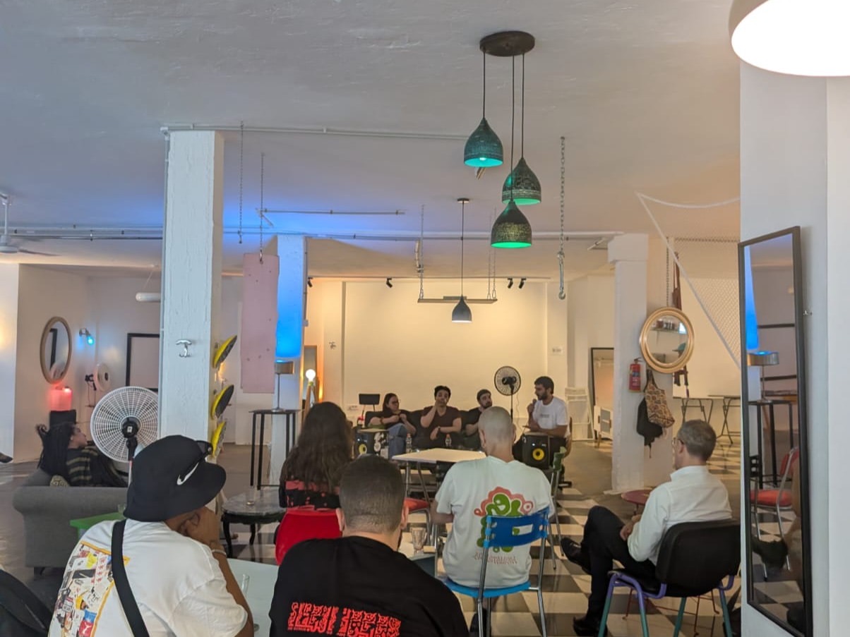 Panel discussion in progress at L'Ecurie, Tunis